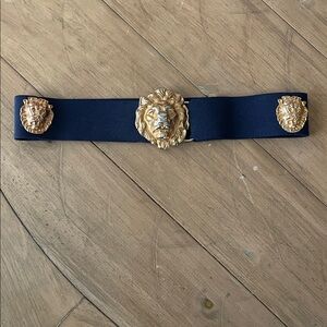 Vintage belt featuring the brand's iconic lion head motif